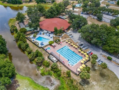 Lake Sparkle 55+ Partially FURNISHED LAKEFRONT Condominium on Country Club At Silver Springs Shores in Florida - for sale on GolfHomes.com, golf home, golf lot