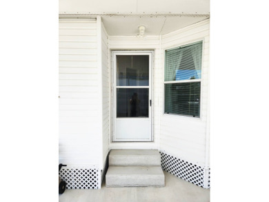 Welcome -In!!!! This meticulously maintained 2 bed /2 bath home on Spanish Lakes Fairways in Florida - for sale on GolfHomes.com, golf home, golf lot