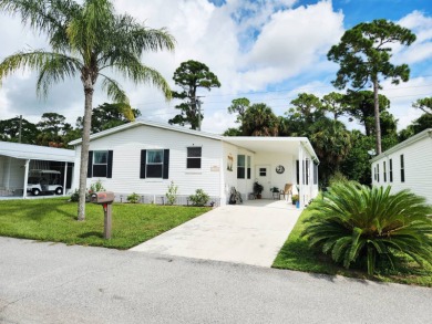 Welcome -In!!!! This meticulously maintained 2 bed /2 bath home on Spanish Lakes Fairways in Florida - for sale on GolfHomes.com, golf home, golf lot