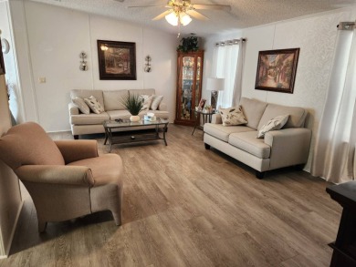 Welcome -In!!!! This meticulously maintained 2 bed /2 bath home on Spanish Lakes Fairways in Florida - for sale on GolfHomes.com, golf home, golf lot