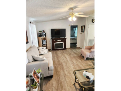 Welcome -In!!!! This meticulously maintained 2 bed /2 bath home on Spanish Lakes Fairways in Florida - for sale on GolfHomes.com, golf home, golf lot