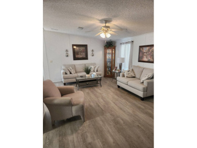 Welcome -In!!!! This meticulously maintained 2 bed /2 bath home on Spanish Lakes Fairways in Florida - for sale on GolfHomes.com, golf home, golf lot