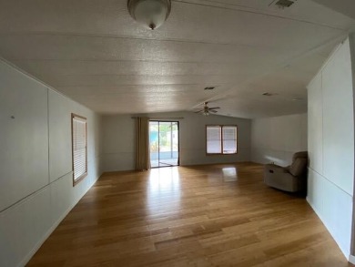 Discover the perfect blend of comfort and active living in this on Indianwood Golf and Country Club in Florida - for sale on GolfHomes.com, golf home, golf lot