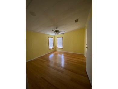 Discover the perfect blend of comfort and active living in this on Indianwood Golf and Country Club in Florida - for sale on GolfHomes.com, golf home, golf lot