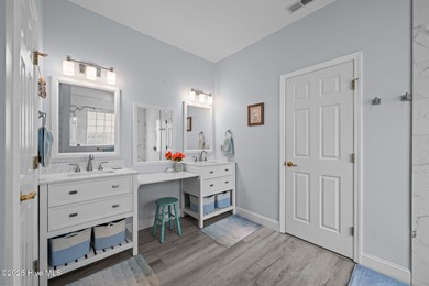 Welcome to this stunning brick and vinyl home nestled in the on Harbour Point Golf Club in North Carolina - for sale on GolfHomes.com, golf home, golf lot