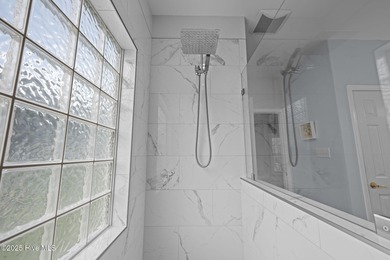 Welcome to this stunning brick and vinyl home nestled in the on Harbour Point Golf Club in North Carolina - for sale on GolfHomes.com, golf home, golf lot