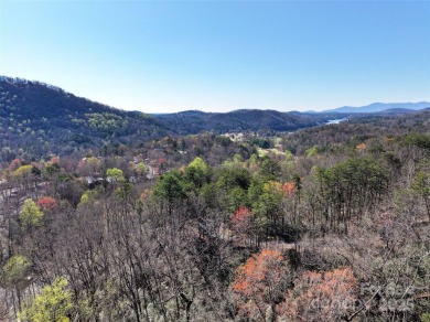 An exceptional opportunity for investors or vacationers seeking on Rumbling Bald Resort on Lake Lure in North Carolina - for sale on GolfHomes.com, golf home, golf lot