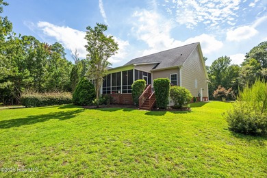 Welcome to this stunning brick and vinyl home nestled in the on Harbour Point Golf Club in North Carolina - for sale on GolfHomes.com, golf home, golf lot