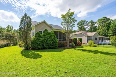 Welcome to this stunning brick and vinyl home nestled in the on Harbour Point Golf Club in North Carolina - for sale on GolfHomes.com, golf home, golf lot