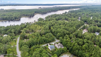 Welcome to this stunning brick and vinyl home nestled in the on Harbour Point Golf Club in North Carolina - for sale on GolfHomes.com, golf home, golf lot