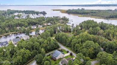 Welcome to this stunning brick and vinyl home nestled in the on Harbour Point Golf Club in North Carolina - for sale on GolfHomes.com, golf home, golf lot
