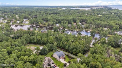 Welcome to this stunning brick and vinyl home nestled in the on Harbour Point Golf Club in North Carolina - for sale on GolfHomes.com, golf home, golf lot