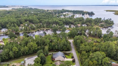 Welcome to this stunning brick and vinyl home nestled in the on Harbour Point Golf Club in North Carolina - for sale on GolfHomes.com, golf home, golf lot