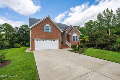 Welcome to this stunning brick and vinyl home nestled in the on Harbour Point Golf Club in North Carolina - for sale on GolfHomes.com, golf home, golf lot