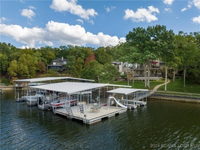 One of 6 Mile Cove's finest waterfront estates situated on 200 on Tan-Tar-A Golf Club in Missouri - for sale on GolfHomes.com, golf home, golf lot