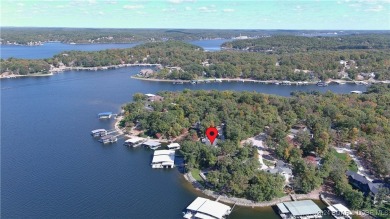 One of 6 Mile Cove's finest waterfront estates situated on 200 on Tan-Tar-A Golf Club in Missouri - for sale on GolfHomes.com, golf home, golf lot