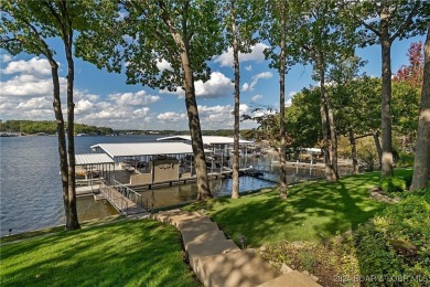 One of 6 Mile Cove's finest waterfront estates situated on 200 on Tan-Tar-A Golf Club in Missouri - for sale on GolfHomes.com, golf home, golf lot