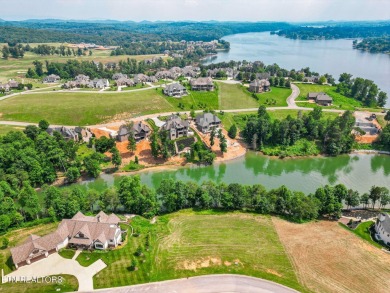 Enjoy breathtaking views into your deep water cove in the on Wind River Golf Course in Tennessee - for sale on GolfHomes.com, golf home, golf lot