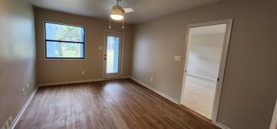 Ground level condo overlooking pool and fairwaypletely painted on Rockport Country Club in Texas - for sale on GolfHomes.com, golf home, golf lot