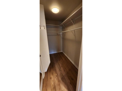 Ground level condo overlooking pool and fairwaypletely painted on Rockport Country Club in Texas - for sale on GolfHomes.com, golf home, golf lot