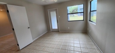 Ground level condo overlooking pool and fairwaypletely painted on Rockport Country Club in Texas - for sale on GolfHomes.com, golf home, golf lot