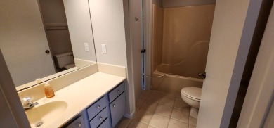 Ground level condo overlooking pool and fairwaypletely painted on Rockport Country Club in Texas - for sale on GolfHomes.com, golf home, golf lot