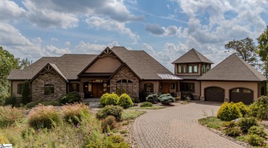 Perched atop a private 4.13-acre peak within the prestigious on The Cliffs at Glassy Golf and Country Club in South Carolina - for sale on GolfHomes.com, golf home, golf lot