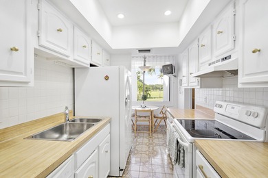 Welcome to your new home in Boca West--where luxury, lifestyle on  in Florida - for sale on GolfHomes.com, golf home, golf lot