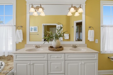 Welcome to life overlooking the first tee at Rivers Edge. Tucked on Rivers Edge Golf Club in North Carolina - for sale on GolfHomes.com, golf home, golf lot