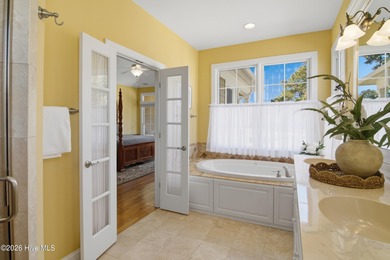 Welcome to life overlooking the first tee at Rivers Edge. Tucked on Rivers Edge Golf Club in North Carolina - for sale on GolfHomes.com, golf home, golf lot