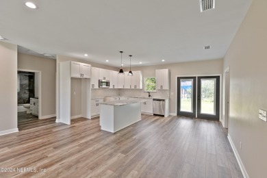 This brand new construction, split BR and open concept floor on Keystone Heights Golf and Country Club in Florida - for sale on GolfHomes.com, golf home, golf lot