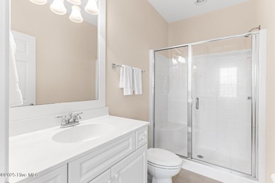 Welcome to life overlooking the first tee at Rivers Edge. Tucked on Rivers Edge Golf Club in North Carolina - for sale on GolfHomes.com, golf home, golf lot