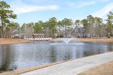 Welcome to life overlooking the first tee at Rivers Edge. Tucked on Rivers Edge Golf Club in North Carolina - for sale on GolfHomes.com, golf home, golf lot