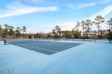 Welcome to life overlooking the first tee at Rivers Edge. Tucked on Rivers Edge Golf Club in North Carolina - for sale on GolfHomes.com, golf home, golf lot
