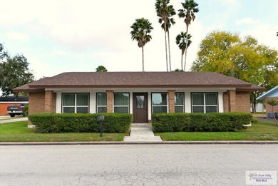 Located in the well-sought out neighborhood of Palm Valley on Harlingen Country Club in Texas - for sale on GolfHomes.com, golf home, golf lot