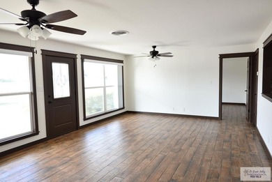 Located in the well-sought out neighborhood of Palm Valley on Harlingen Country Club in Texas - for sale on GolfHomes.com, golf home, golf lot