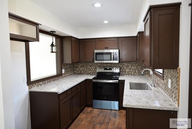 Located in the well-sought out neighborhood of Palm Valley on Harlingen Country Club in Texas - for sale on GolfHomes.com, golf home, golf lot