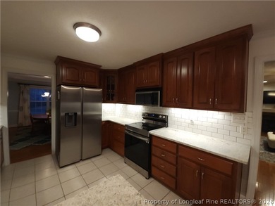 This gorgeously, well kept, vacation style home is located in on Baywood Golf Club in North Carolina - for sale on GolfHomes.com, golf home, golf lot