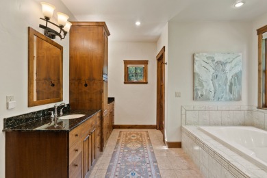 Elegant and distinctive, this Whispering Rock residence offers on Eagle Bend Golf Course in Montana - for sale on GolfHomes.com, golf home, golf lot