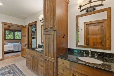 Elegant and distinctive, this Whispering Rock residence offers on Eagle Bend Golf Course in Montana - for sale on GolfHomes.com, golf home, golf lot
