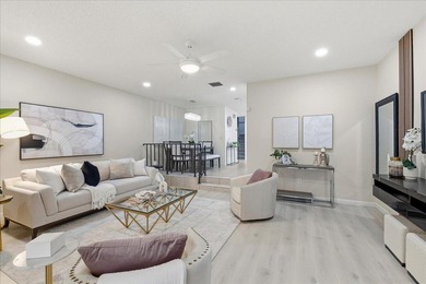 Wake up to soft morning light and tranquil lake views in this on Boca Lago Golf and Country Club in Florida - for sale on GolfHomes.com, golf home, golf lot