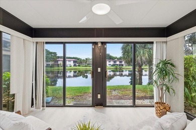 Wake up to soft morning light and tranquil lake views in this on Boca Lago Golf and Country Club in Florida - for sale on GolfHomes.com, golf home, golf lot