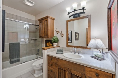 Elegant and distinctive, this Whispering Rock residence offers on Eagle Bend Golf Course in Montana - for sale on GolfHomes.com, golf home, golf lot