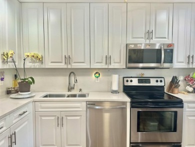 Welcome to this beautifully renovated corner unit, nestled in on Boca Lago Golf and Country Club in Florida - for sale on GolfHomes.com, golf home, golf lot