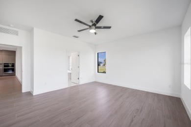 This exceptional new construction home, built by ONX Homes, is on Burnt Store Golf Club in Florida - for sale on GolfHomes.com, golf home, golf lot