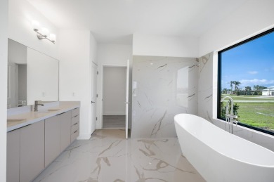 This exceptional new construction home, built by ONX Homes, is on Burnt Store Golf Club in Florida - for sale on GolfHomes.com, golf home, golf lot