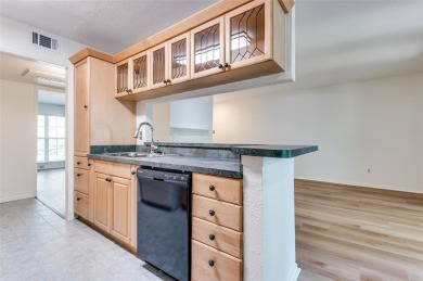 Enjoy tree top living in this nicely renovated condo in the on Stevens Park Golf Course in Texas - for sale on GolfHomes.com, golf home, golf lot