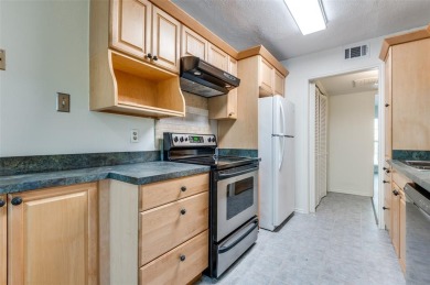 Enjoy tree top living in this nicely renovated condo in the on Stevens Park Golf Course in Texas - for sale on GolfHomes.com, golf home, golf lot