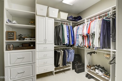 Nestled within a prestigious gated golf community, this on Brunswick Plantation and Golf Resorts in North Carolina - for sale on GolfHomes.com, golf home, golf lot