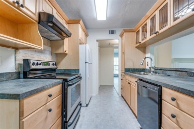 Enjoy tree top living in this nicely renovated condo in the on Stevens Park Golf Course in Texas - for sale on GolfHomes.com, golf home, golf lot